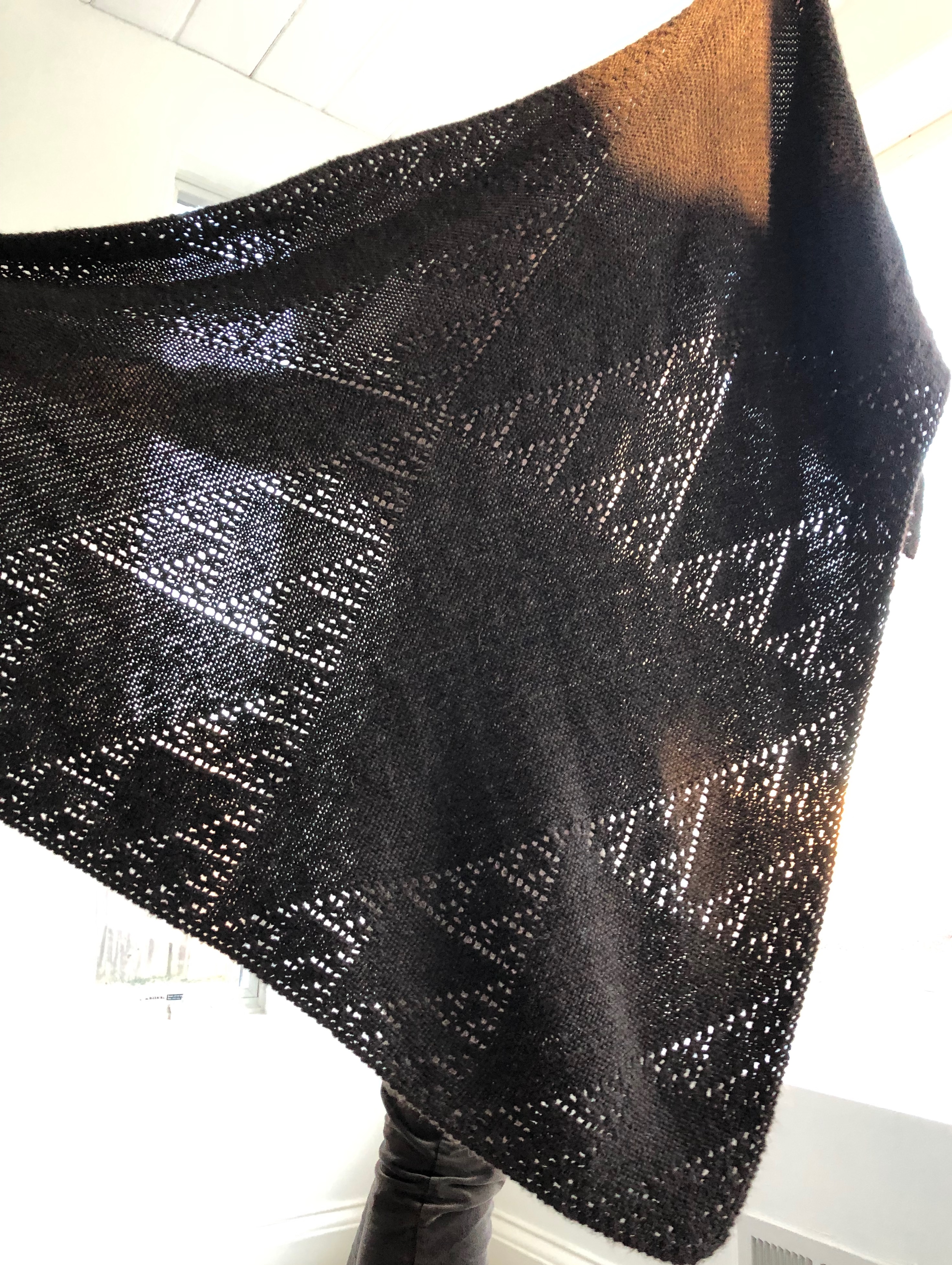 A shawl knitted according to the rule of Pascal's triangle mod 2, by brienne brown