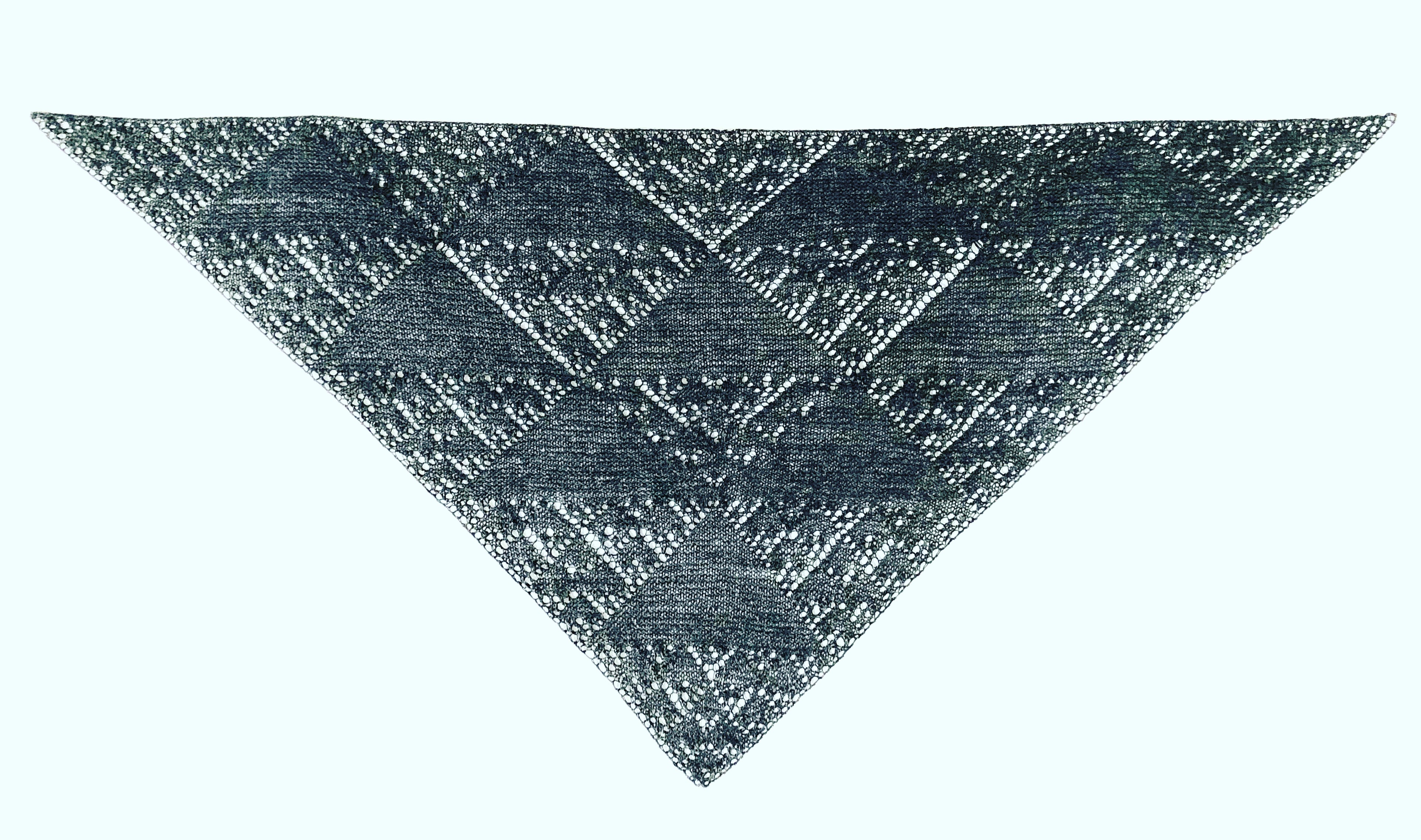 A shawl knitted according to the rule of Pascal's triangle mod 5, by brienne brown